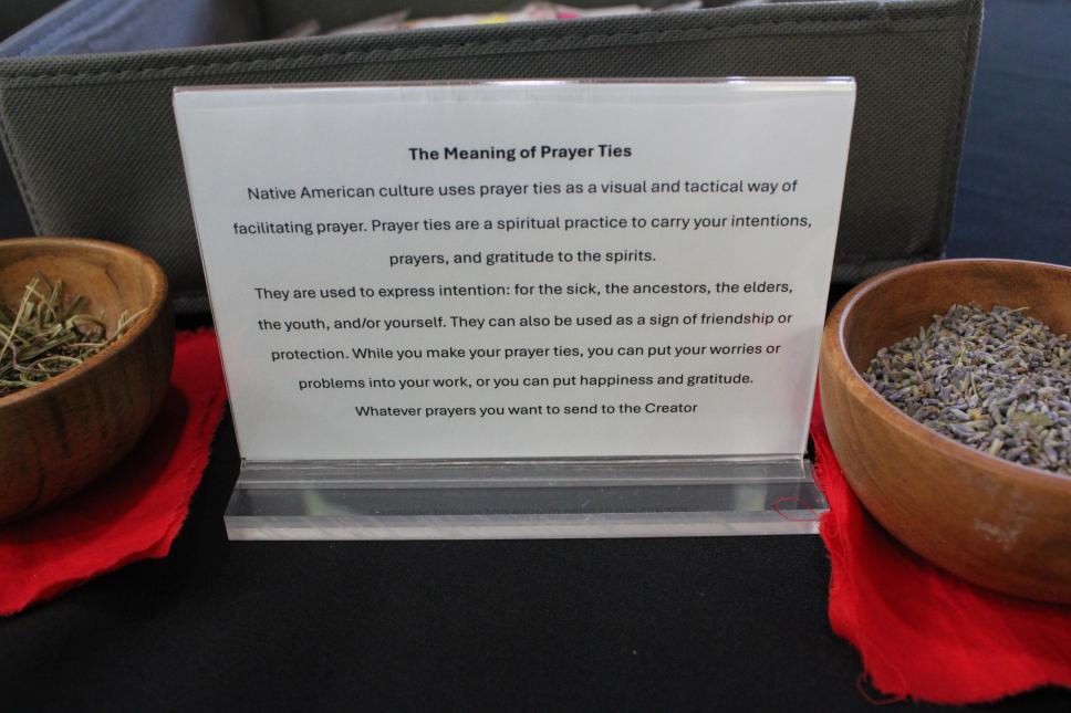 A picture of the medicine on the tables that were available for participants to make prayer ties.